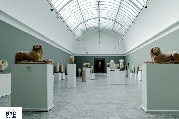 Visitors exploring modern art galleries inside MoMA