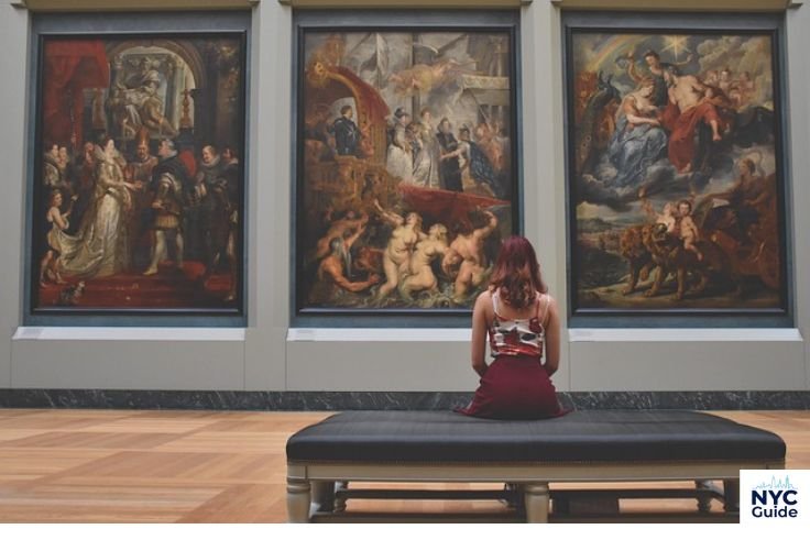 Visitors viewing European paintings inside the Metropolitan Museum of Art