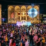 Lincoln Center Summer for the City festival crowd dancing under disco ball NYC