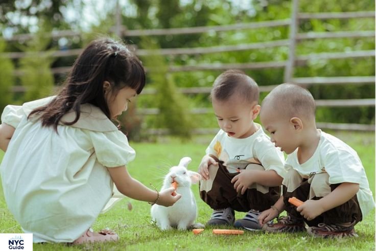 “Family picnic with children in Central Park near East Meadow”